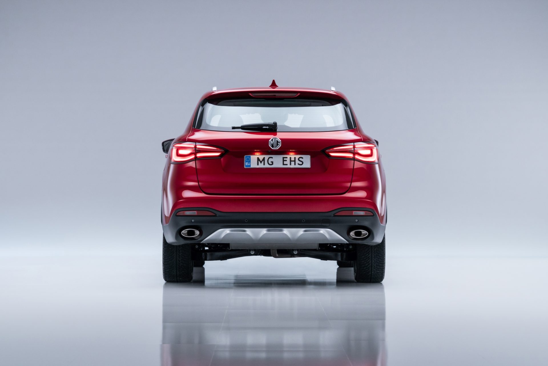 MG Ehs plug-in hybrid luxury phantom red Renting Finders trasera